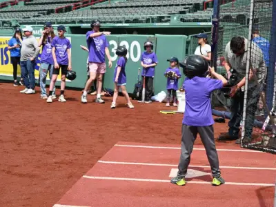 Children of military families sign screen time pledge ahead of Fenway softball game