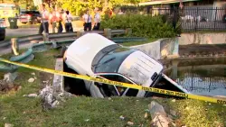 Crews remove truck from South Miami canal