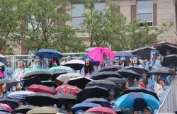 Columbia acting president defends academic freedom at relatively quiet commencement